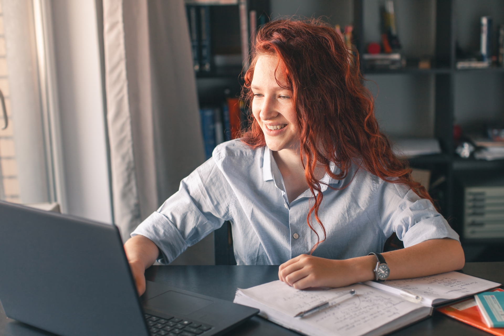 Female JD-Next Admissions Assessment Student Studying on Laptop