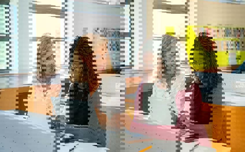 Pre-Law Advisor showing prospective law student how JD-Next can strengthen her law school application