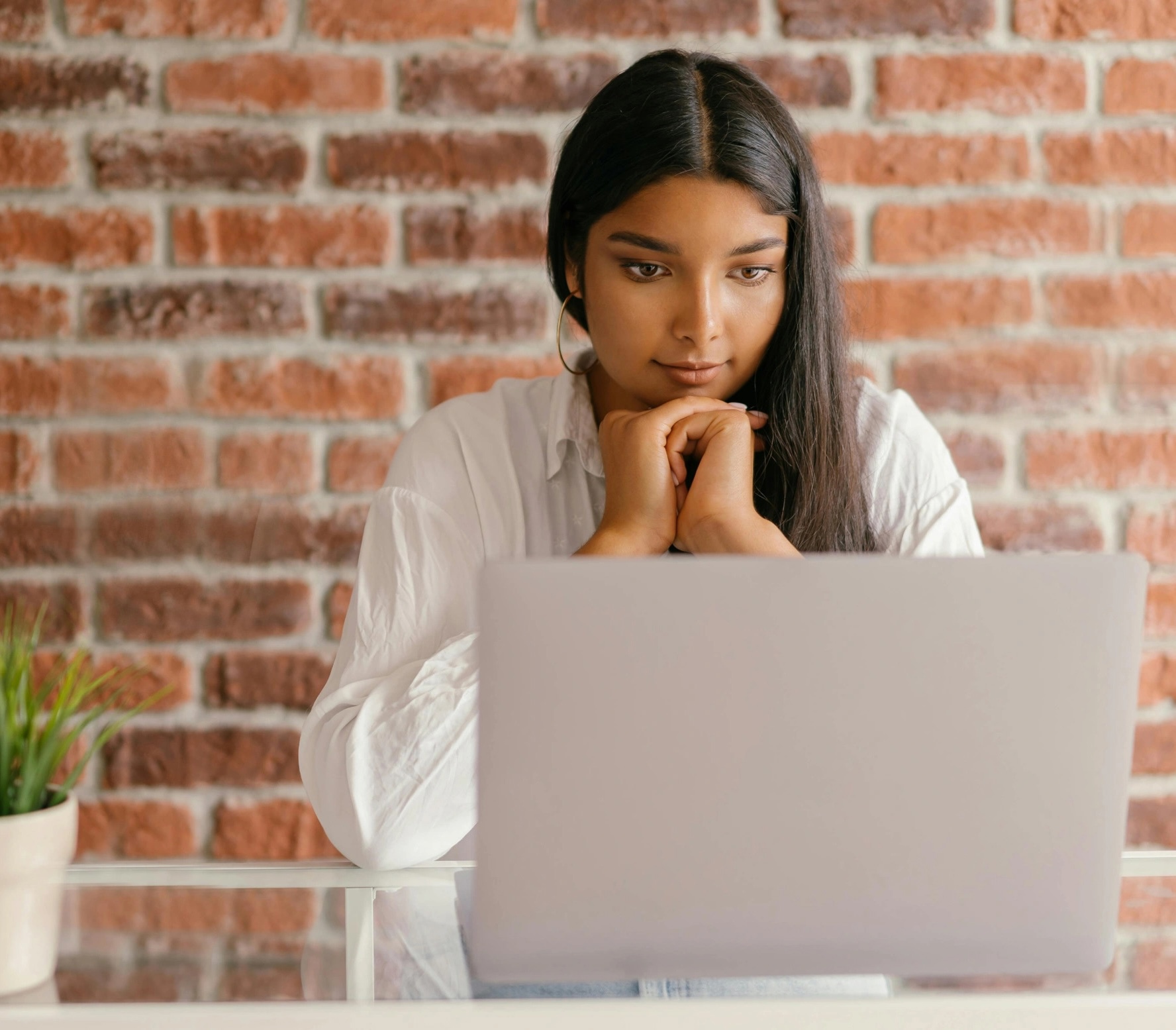 Student on laptop looking at JD-Next Admissions Assessment